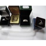 Five Modern Dress Rings, stamped "925". (5)