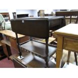 A 'D' Ended Oak Dining Table, on turned and block supports, a similar tea trolley; circular topped