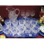 A Lead Crystal Jug, of baluster form on star patterned base, a set of Tudor crystal wines, four