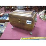 An Early XIX Century Mahogany Tea Caddy, of bowed sarcophagus form, boxwood stringing and