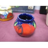 A Moorcroft Pottery Miniature Vase, decorated with Red Rose design by Emma Bossons, shape 55/2,