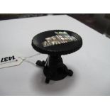 A XIX Century Whitby Jet Miniature Occasional Table, with shell inlaid detail (leg damaged).