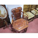 A Chinese Hardwood Chair, of hexagonal form, pierced stylised back rest and sides on stretchered