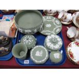 Wedgwood Green Jasperware, of eight pieces, including fruit bowl, lidded jars, two plates:- One