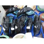 A Collection of Five Poole Pottery Dolphins, in turquoise and black glazes, printed marks, 27cm long