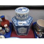 A Chinese Style Blue and White Hexagonal Shaped Jar and Cover, with floral decoration.
