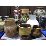 A 1930's Beswick Ribbed Jug, with mottled orange ground, a Falconware jug, two porcelain military