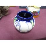 A Moorcroft Pottery Miniature Vase, decorated with White Rose design by Emma Bossons, shape 55/2,