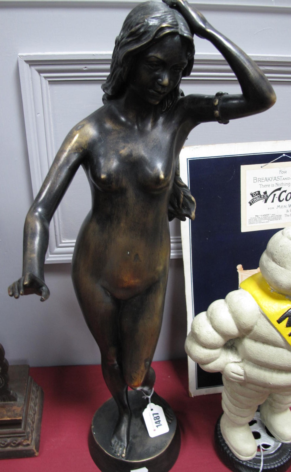 After J. Merel A Bronzed Figure of a Nude, signature to base.