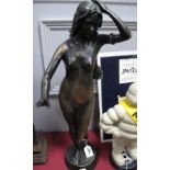 After J. Merel A Bronzed Figure of a Nude, signature to base.