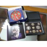 A GB Proof Set, 2008, UK Brilliant Uncirculated Coin Collections: 1987, 2004 and 2006.