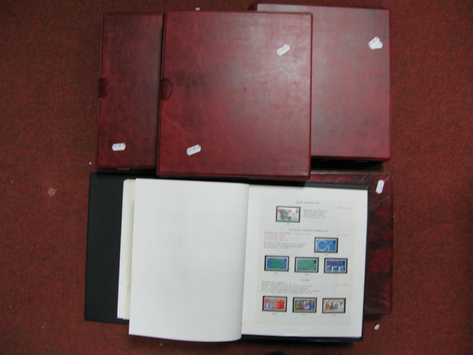 Four Albums Containing G.B Presentation Packs, miniature sheets, booklets with high values and