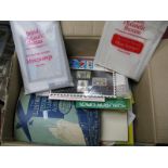 A Box of All World Stamps, mint and used in packets envelopes, junior albums. Mint in presentation