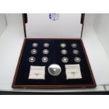 A Cased Windsor Mint "Popes of the Modern Times" Coin Set, twelve gold coins, eleven certificates