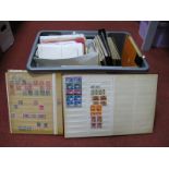 A Large Accumulation of Stamps on Loose Album Pages, in Stockbooks, including all world mint and