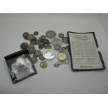 One Pound and Forty Pence, (total face value) of pre-1947 silver coins. A trade dollar, 1910, F. A