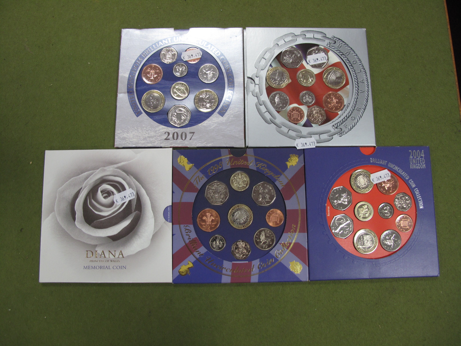 Four Royal Mint Brilliant Uncirculated Coin Collection Sets 1998, 2004, 2006, 2007, plus a Diana