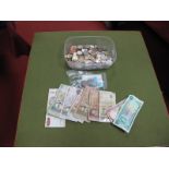 A Quantity of Foreign Base Metal Coinages, (redeemable coins noted), eleven banknotes including