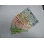 75 Brazil Reals, 700 Morocco Dirhams and 700 United Emirates Dirhams in banknotes.
