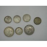 Two Silver Crowns, 1935, 1937, five silver florins, including three Queen Victoria (dates
