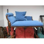 An Early XX Century Upholstered Chaise Longue, on turned legs.