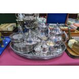 A Plated Four Piece Tea Service, plated butter dish, coasters, plated and engraved tray.
