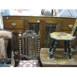 An Unusual Oak Combination Bureau/Cabinet, central glazed doors with leaded sunburst design,