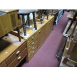 A Yew Effect Two Door Cabinet and similar four drawer cabinet.