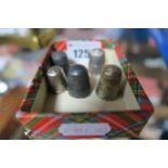 Five Silver Thimbles,