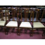 A Set of Four Edwardian Mahogany Dining Chairs, top rail with batwing inlay, pierced splat, drop