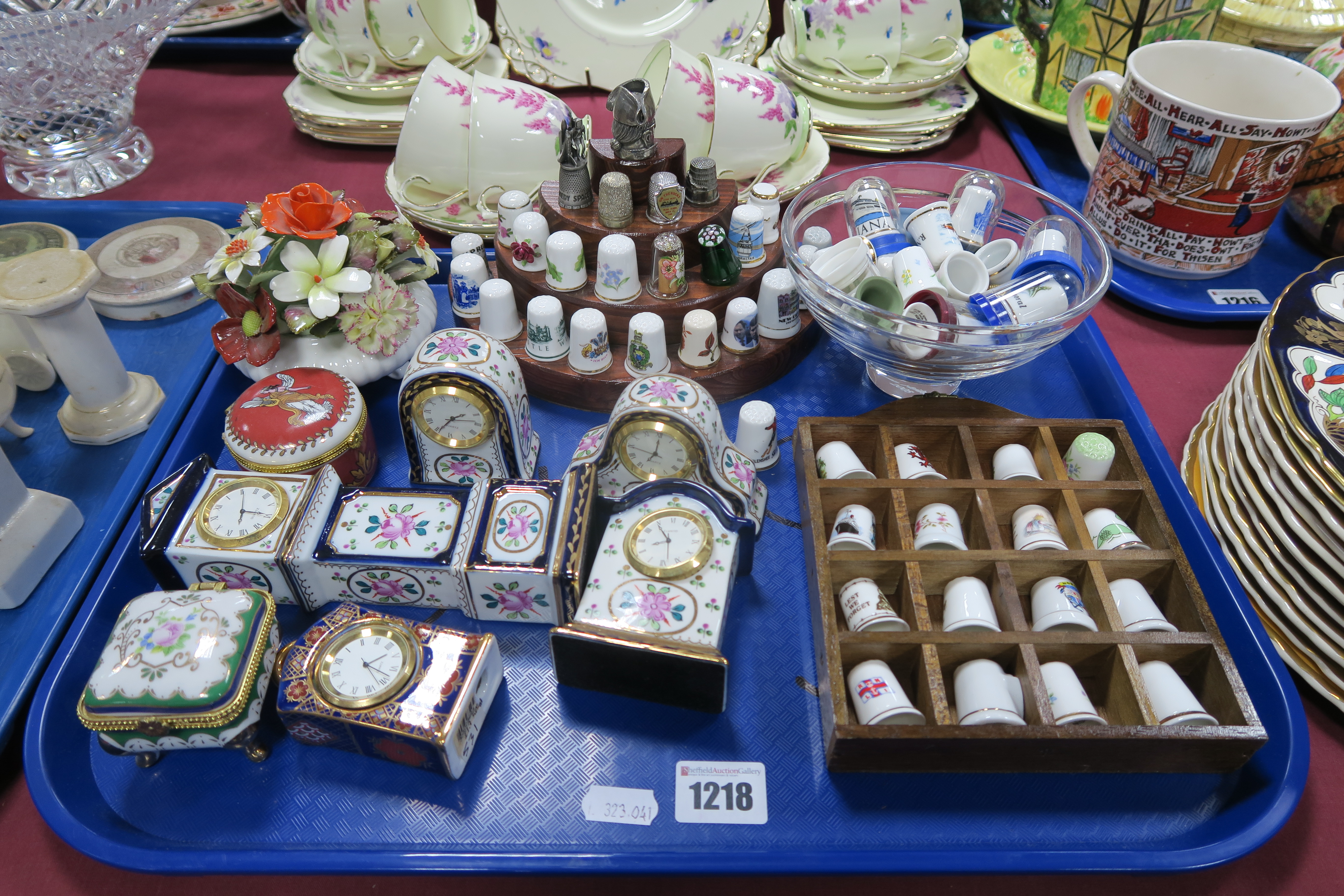 Ceramic Cased Mantel Clocks, thimbles, etc:- One Tray