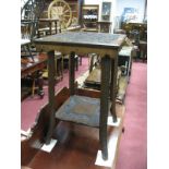 An Early XX Century Carved Oak Occasional Table, the top with carved floral decoration, shaped