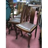 A Set of Six Splat Back Dining Chairs, with drop in seats on cabriole legs.