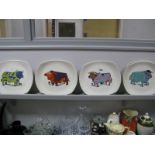 Six Cartwrights Steak Plates, each featuring stylised bull.