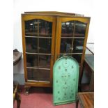 A Mid XX Century Oak Angle Fronted Display Cabinet, with low back, on cabriole legs. A Bagatelle