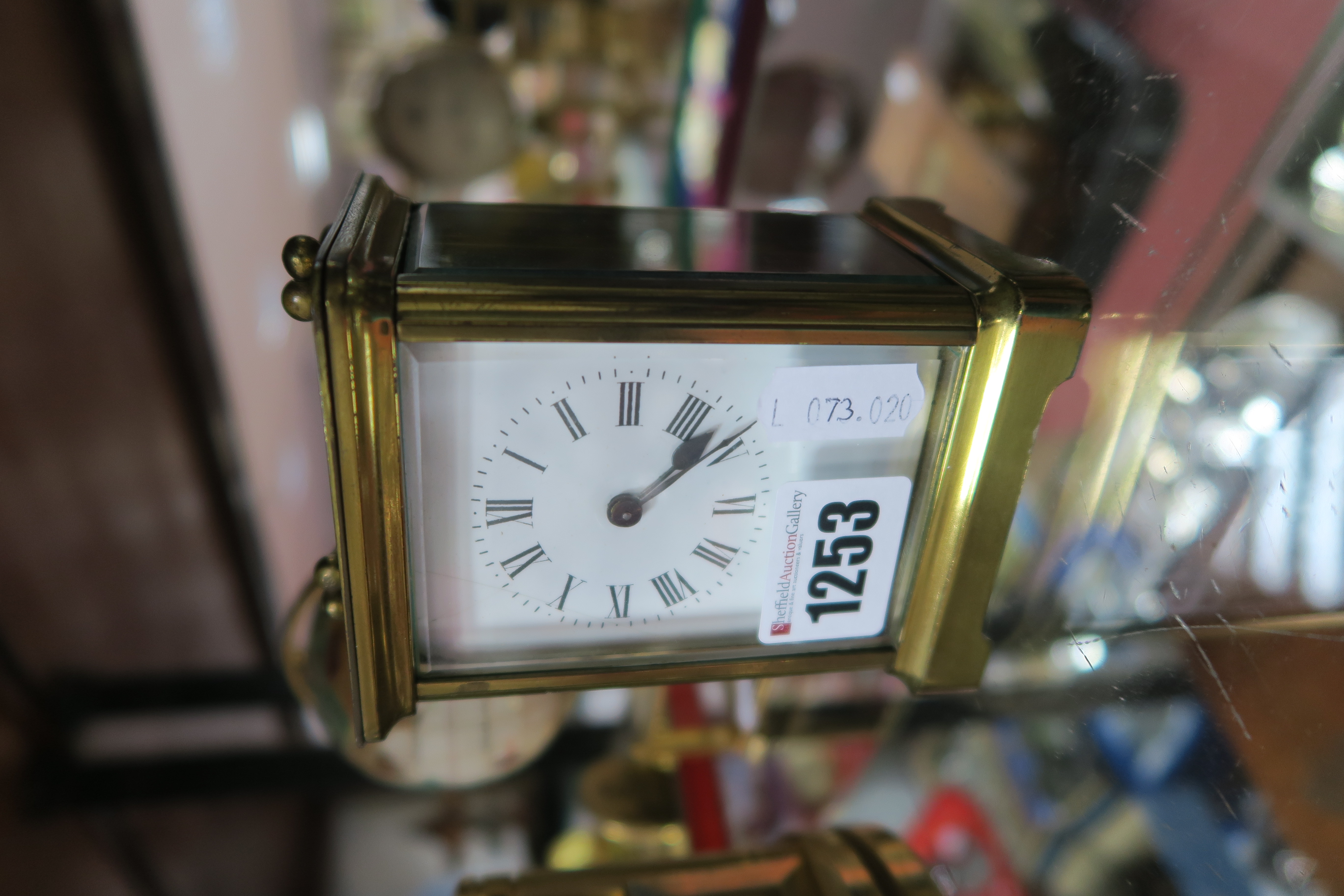 A Brass Cased Carriage Clock, circa early XX Century, with black Roman numerals to white enamel dial