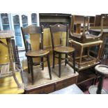 A Pair of Early XX Century Bentwood Chairs, with a patterned top rail and seats. (2)