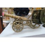 A Heavy Cast Brass Model Canon, length 46cm.