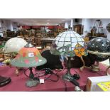 A Modern Reproduction Tiffany Style Table Lamp, leaded glass shade decorated with flowers and