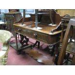 A XIX Century Mahogany Two Drawer Washstand, having shaped back, pierced side supports, on torpedo