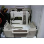 A Bernina Record 930 Electronic Sewing Machine, cased, with carrying handle.