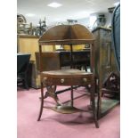An Early XIX Century Mahogany Corner Washstand, with a single drawer, two dummy drawers, swept legs,