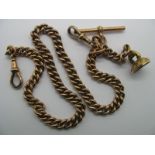 A 9ct Gold Graduated Curb Link Albert Chain, to double swivel style clasps, suspending T-bar and