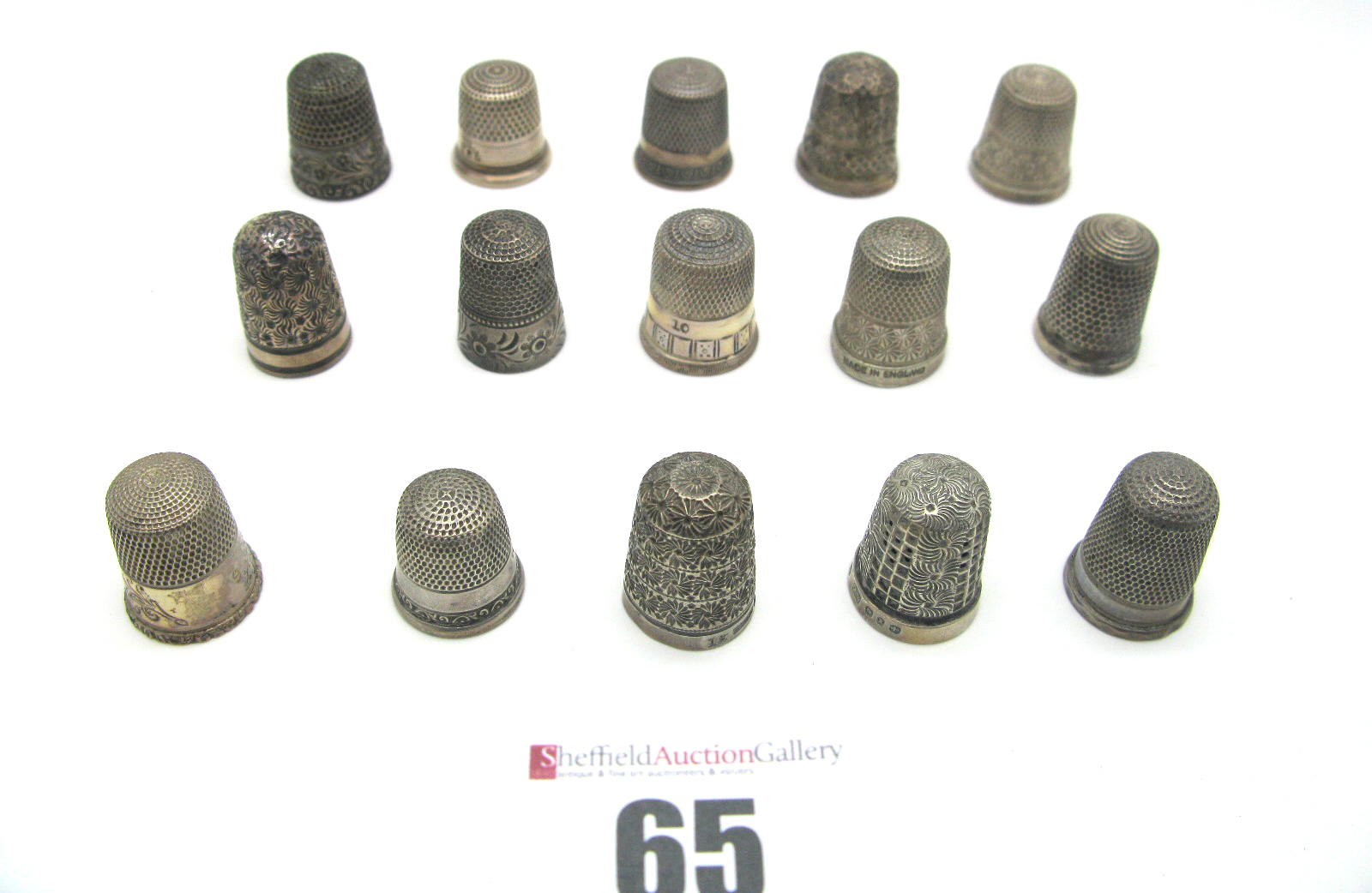 Fifteen Assorted Thimbles, including six hallmarked silver examples, "Sterling Silver" etc. (15)