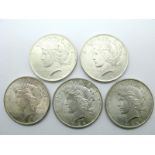 Five United States Silver Peace One Dollar Coins, all dated 1922, regularly good grades.