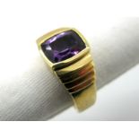 An Amethyst Single Stone Ring, collet rubover set between stepped shoulders, stamped "585" "14K" "