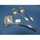 A Pair of Ladles, each of hand hammered finish; Together with A Twin Spout Kings Pattern Ladle. (3)