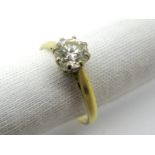 An 18ct Gold Single Stone Diamond Ring, the brilliant cut stone eight claw set. *Goldsmiths Ins