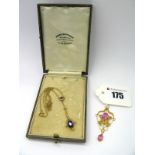 An Edwardian Amethyst Drop Pendant, claw and collet set with pearl highlights, stamped "9ct", on