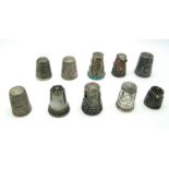 Ten Assorted Thimbles, including cabochon inset, hallmarked silver 1977 Jubilee, "North